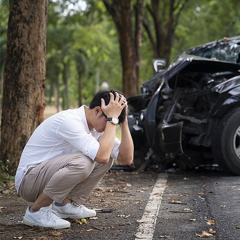man anxious about car crash