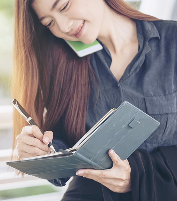 Woman with agenda planner