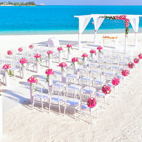 white beach wedding setting