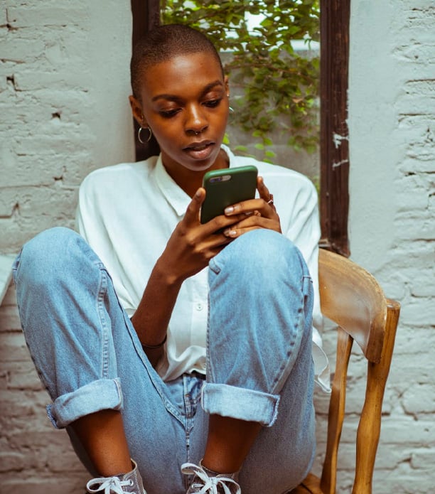 concentrated woman on smartphone